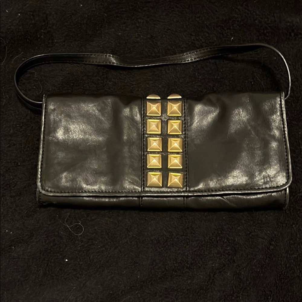 Chic Black Michael Kor’s Leather Clutch with Gold Accents